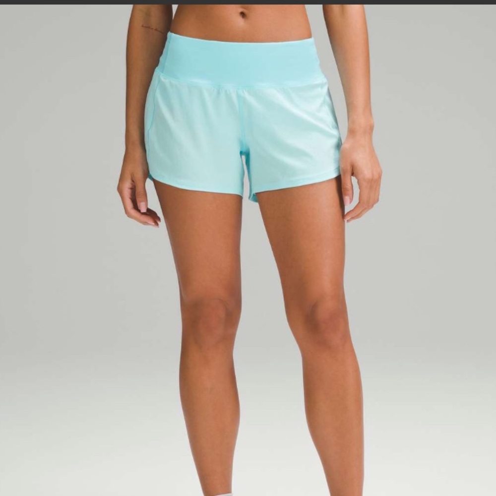 LIKE NEW Lululemon Speed Up Mid-Rise Lined Short 4"
Cyan Blue